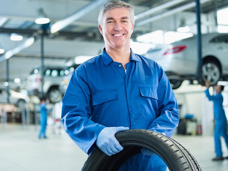 Smiling service mechanic