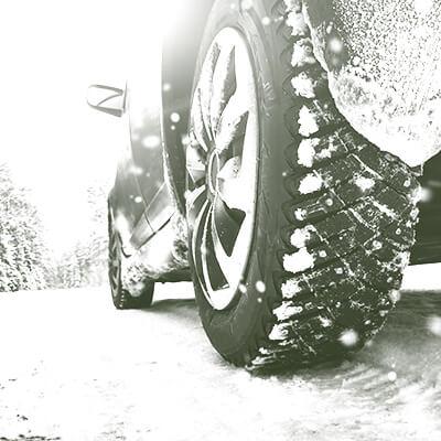 Car tire in the snow
