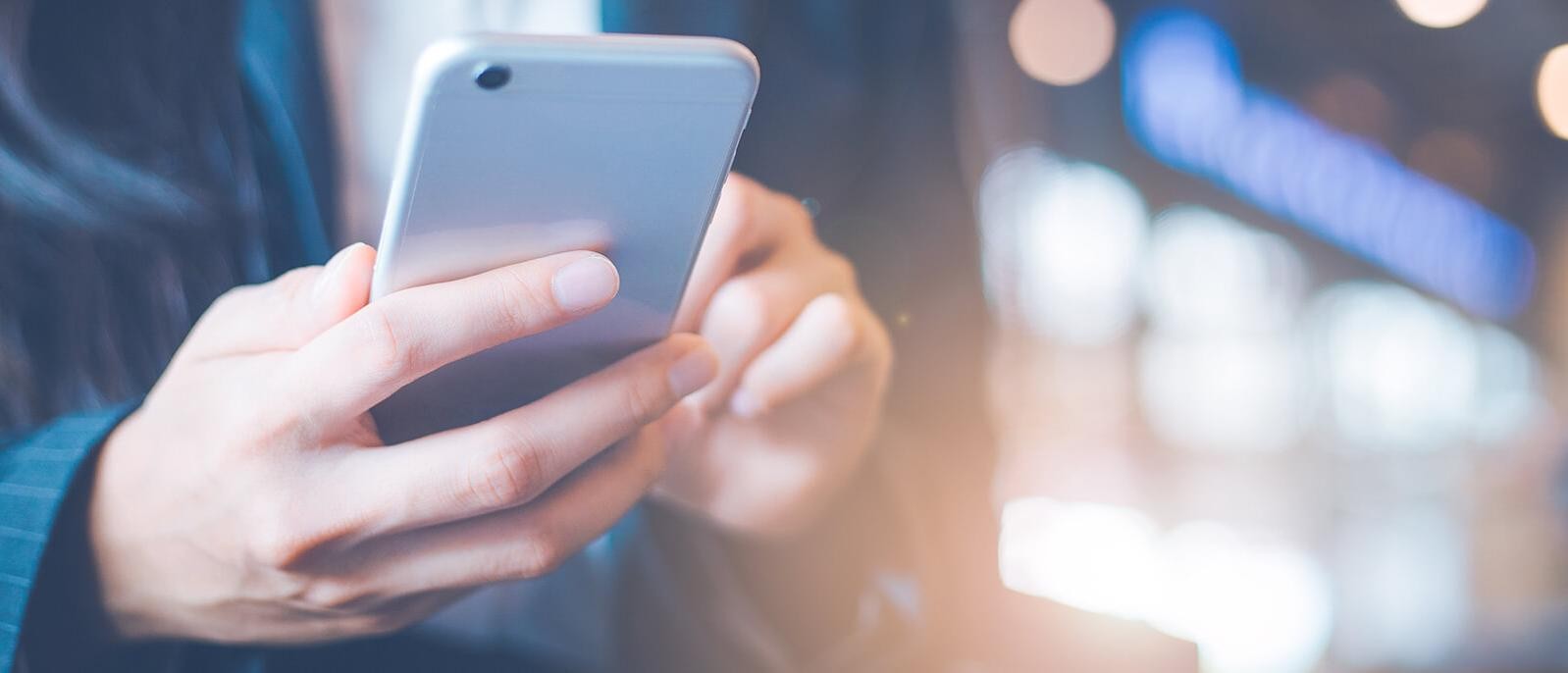 Woman holding a cell phone