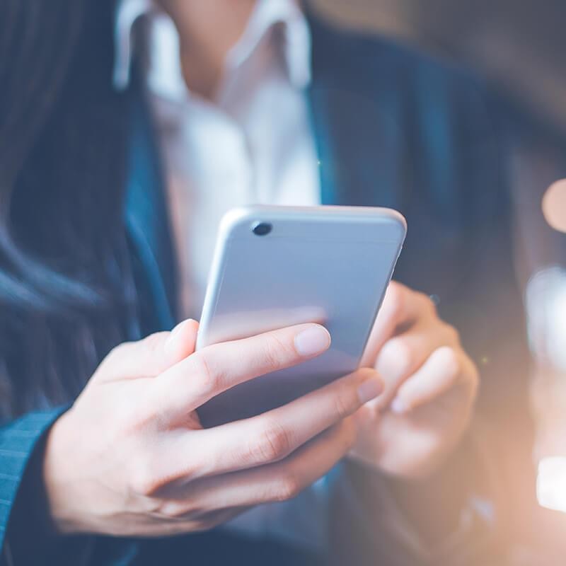 Woman holding a cell phone