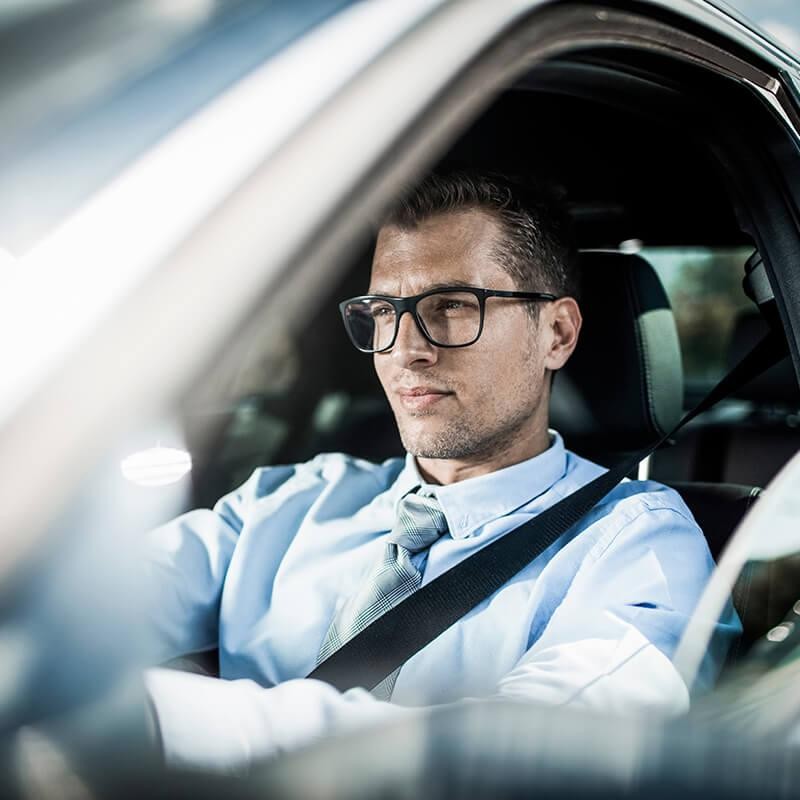 Man driving a car