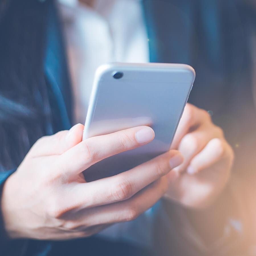 Woman holding a cell phone