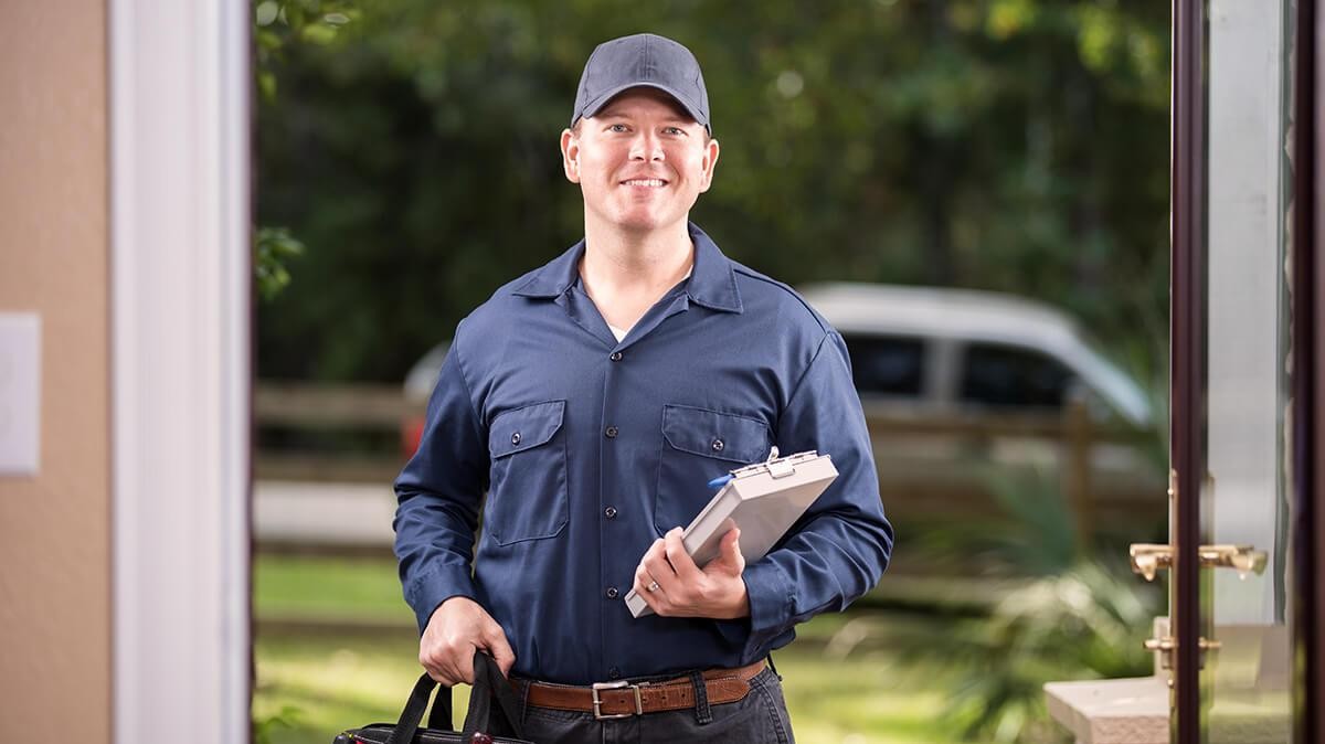 Service mechanic at a customer's front door