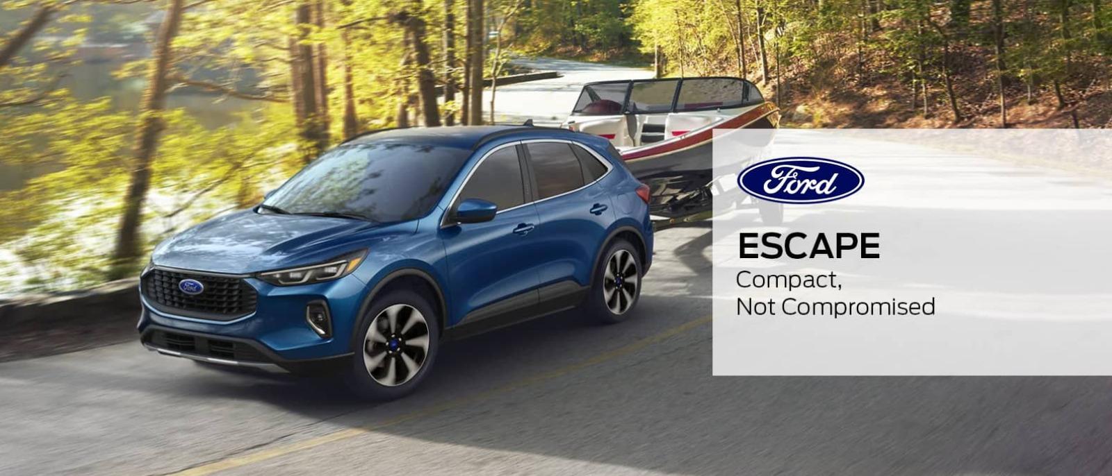 2023 Blue Ford Escape is sprinting on mountain road.