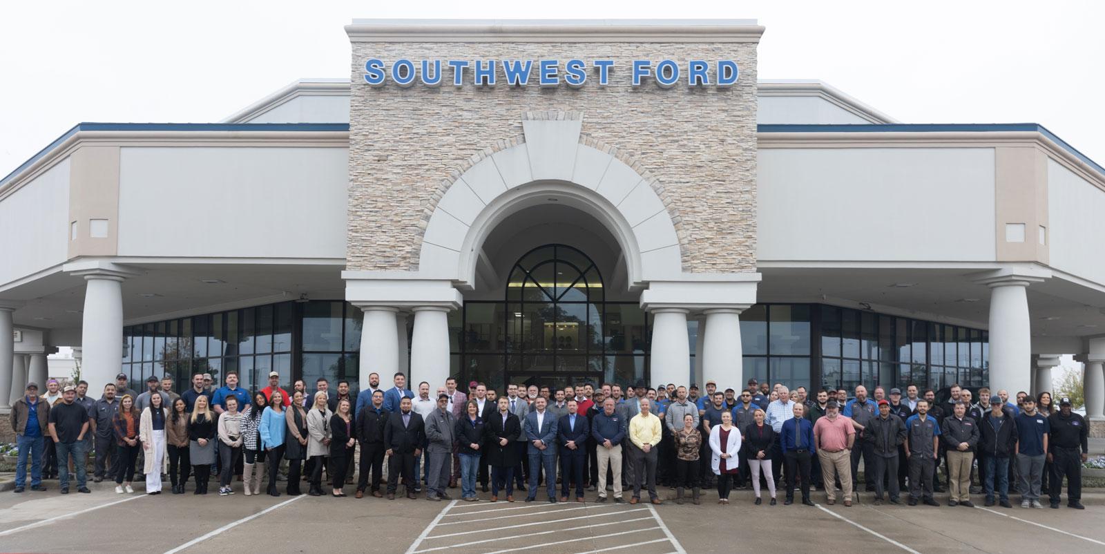 Southwest Ford Staff in front of dealership