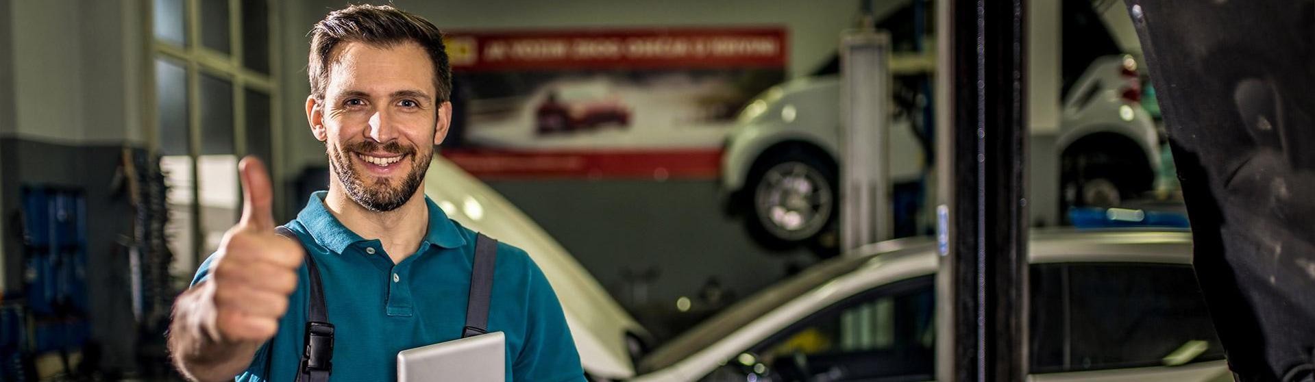 Collision Technician raising thumb 