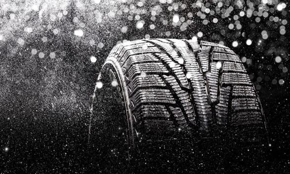 Snow tires available at Hawk Chevy - Close up of a snow tire