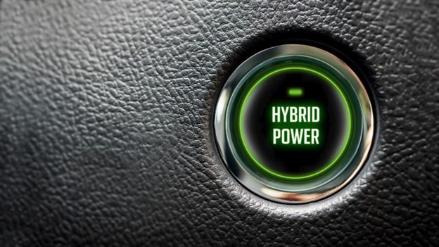 hybrid power message on automobile ignition button with large copy space