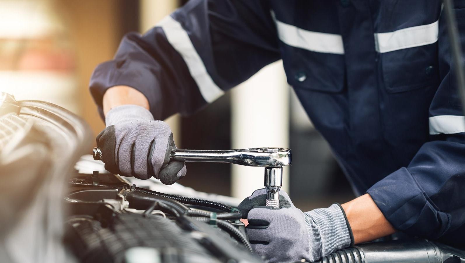 Mechanic working on an engine