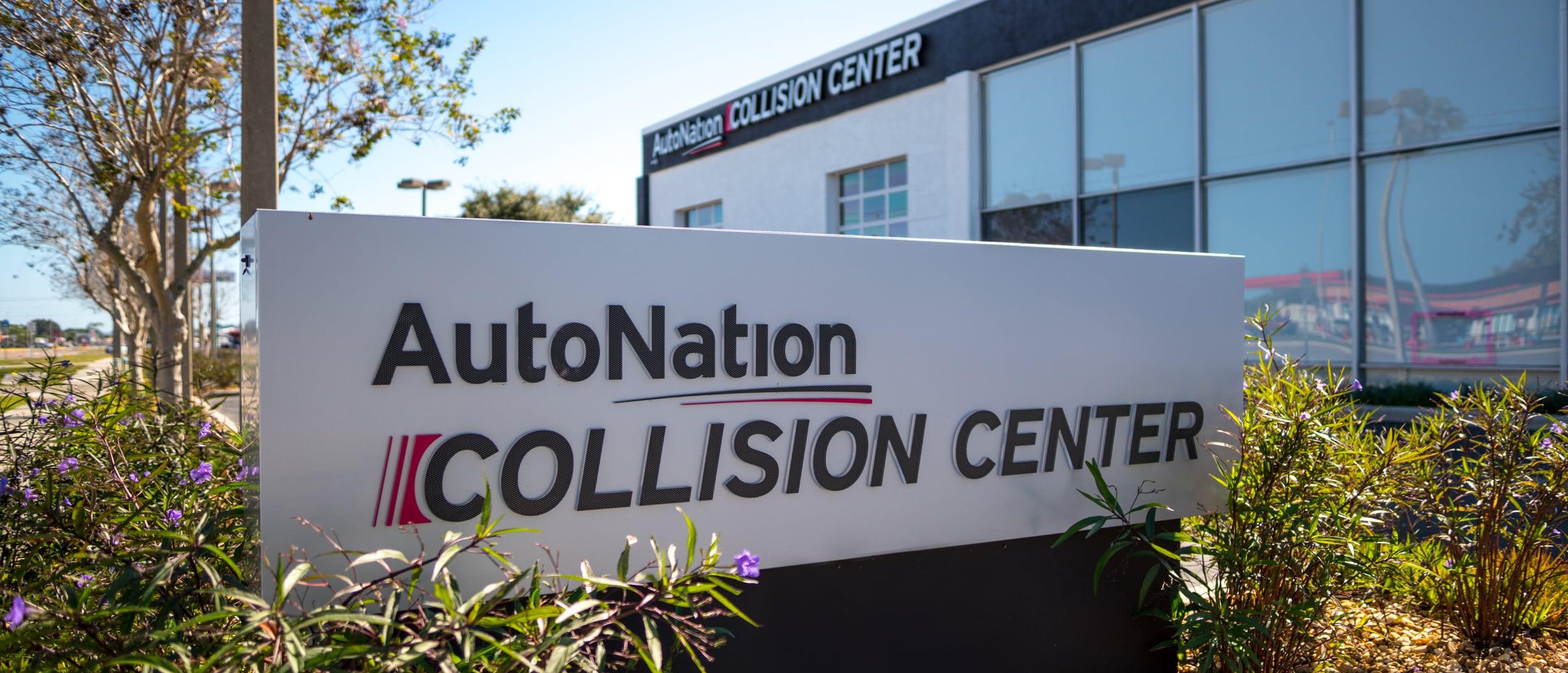 View of sign in front of AutoNation Collision Center at AutoNation Chevrolet Austin