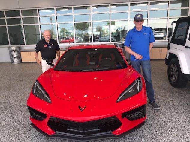Ferman Chevy Tarpon first 2020 Corvette Sale - guest and salesperson