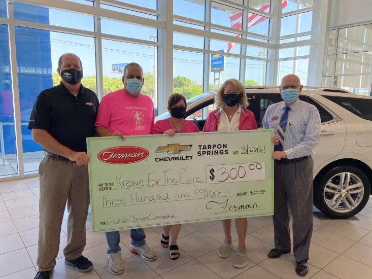 Ferman Chevy of Tarpon Springs presenting sponsor check to Krewe for the Cure