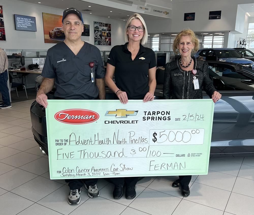 Ferman Chevrolet of Tarpon Springs presents sponsorship check to AdventHealth North Pinellas for Colon Cancer Awareness