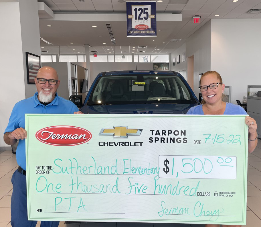Sutherland Elementary receiving sponsorship check from Ferman Chevrolet of Tarpon Springs