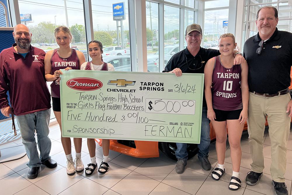 Ferman Chevrolet of Tarpon Springs presents sponsor check to the Ladies of Tarpon Springs High School Flag Football Club