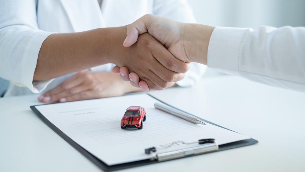 Shaking Hand Making Car Deal