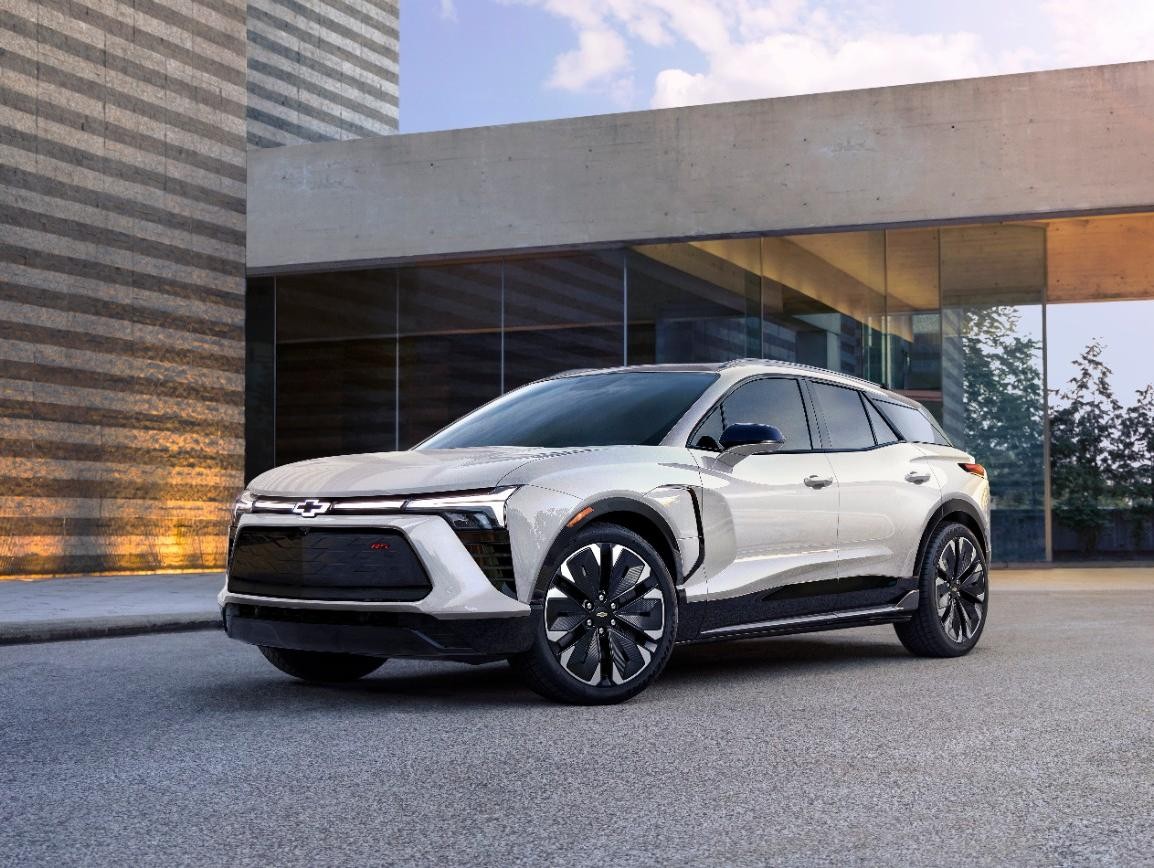 2024 Chevy Blazer EV parked in front of glass building