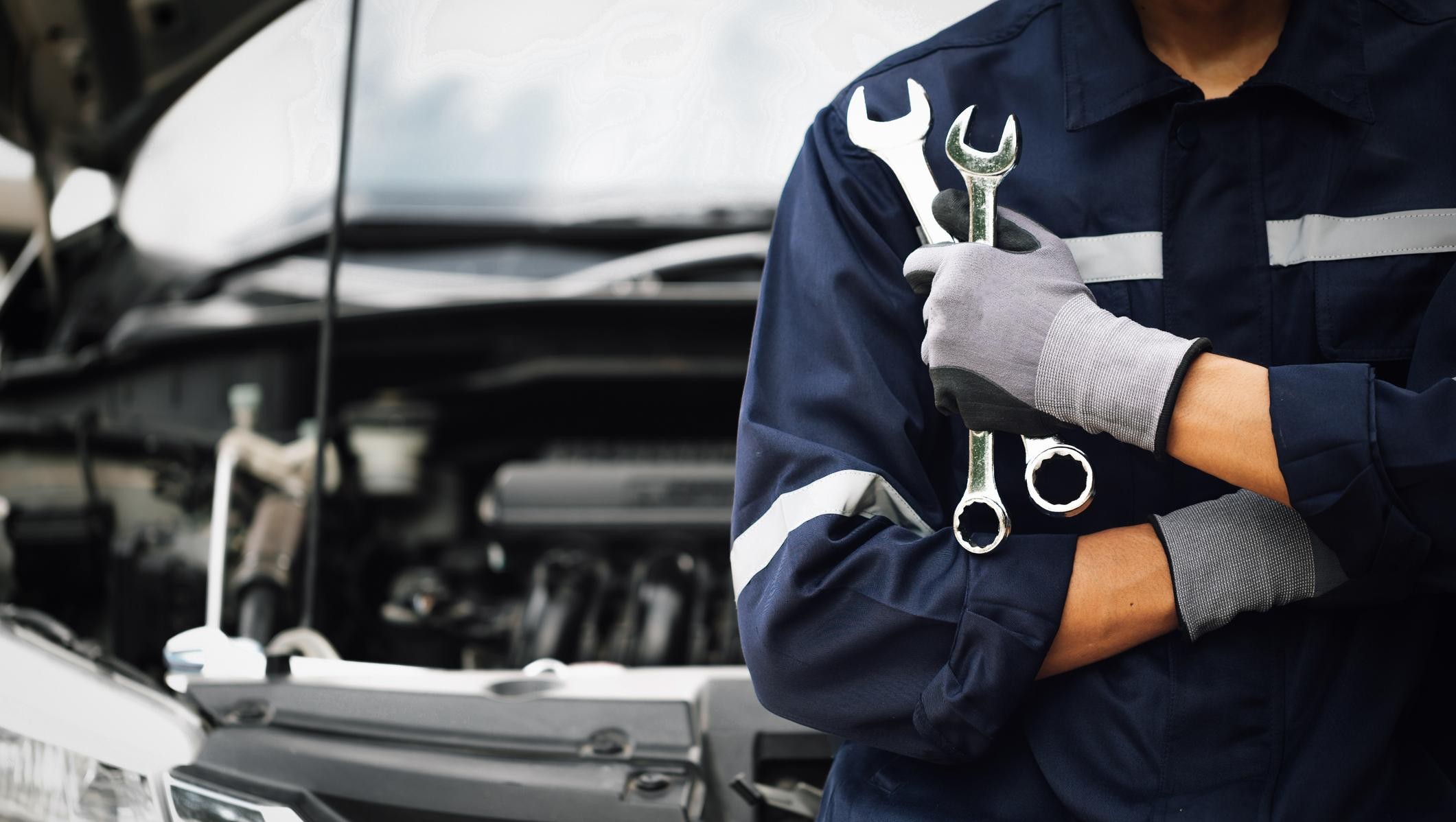 Man taking the keys to his new car with swapping keys icon