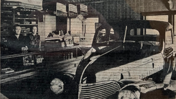 Founder Ed House and bookkeeper Mabel Jans at the Service counter