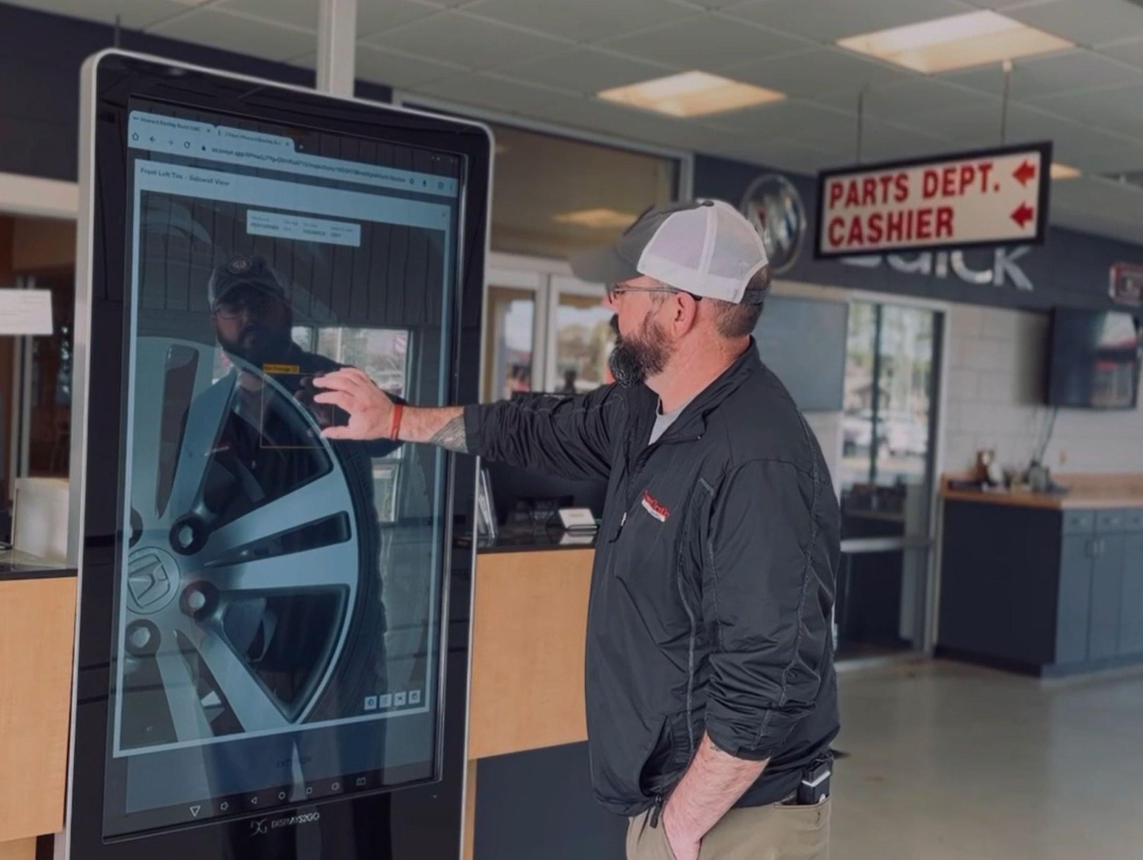 GMC Tech Fixing Brakes