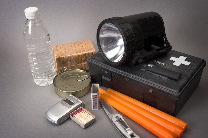 Picture of items included in a car emergency kit