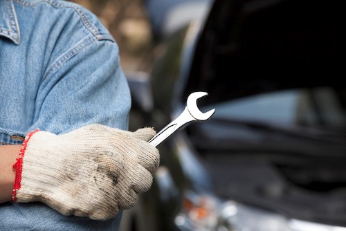 Mechanic holding a wrench