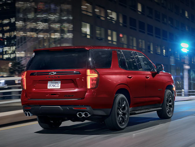 2023 Chevrolet Tahoe Driving at Night Rear View