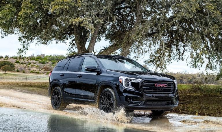 2024 GMC Terrain exterior driving through puddle