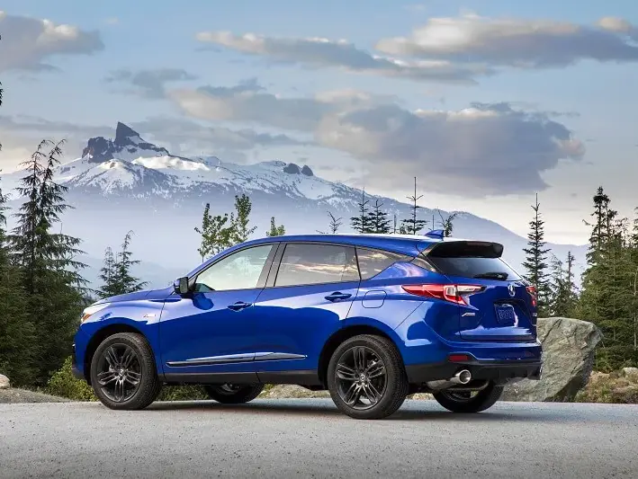 2020 Acura RDX parked in front of some mountains