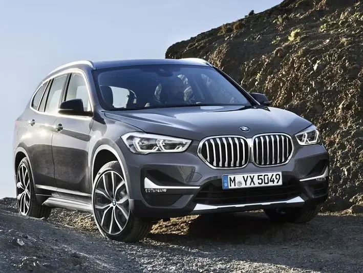 2020 BMW X1 driving on a gravel road
