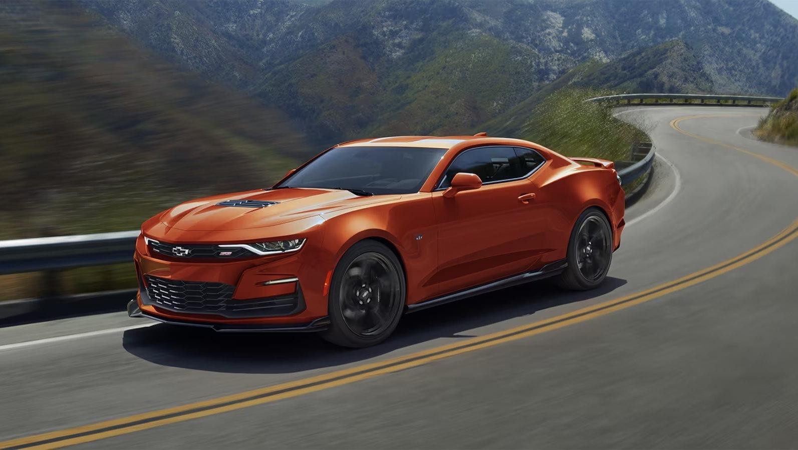 2024 Chevy Camaro driving on a country road