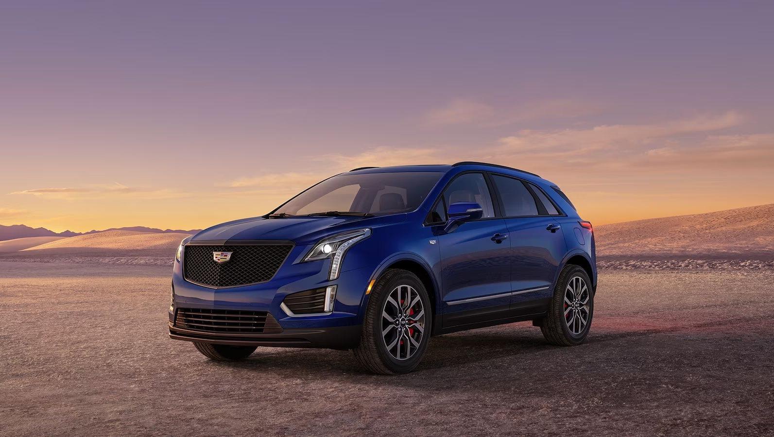 blue 2024 Cadillac XT5 parked in the desert