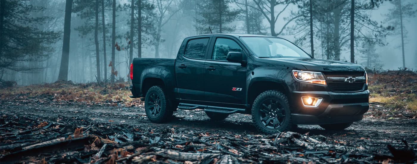 A black 2018 Chevy Colorado Z71 is shown on a misty day after leaving a New Jersey truck dealer.