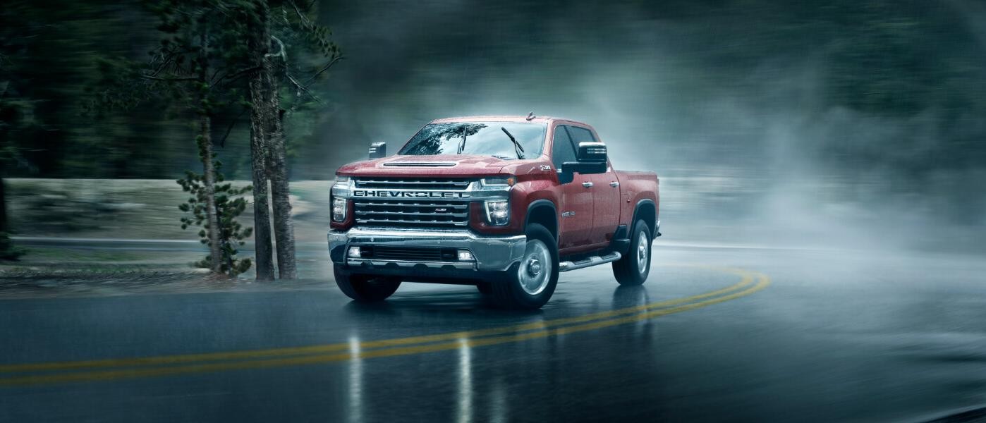 2022 Chevy Silverado 2500 HD exterior driving on a rainy road