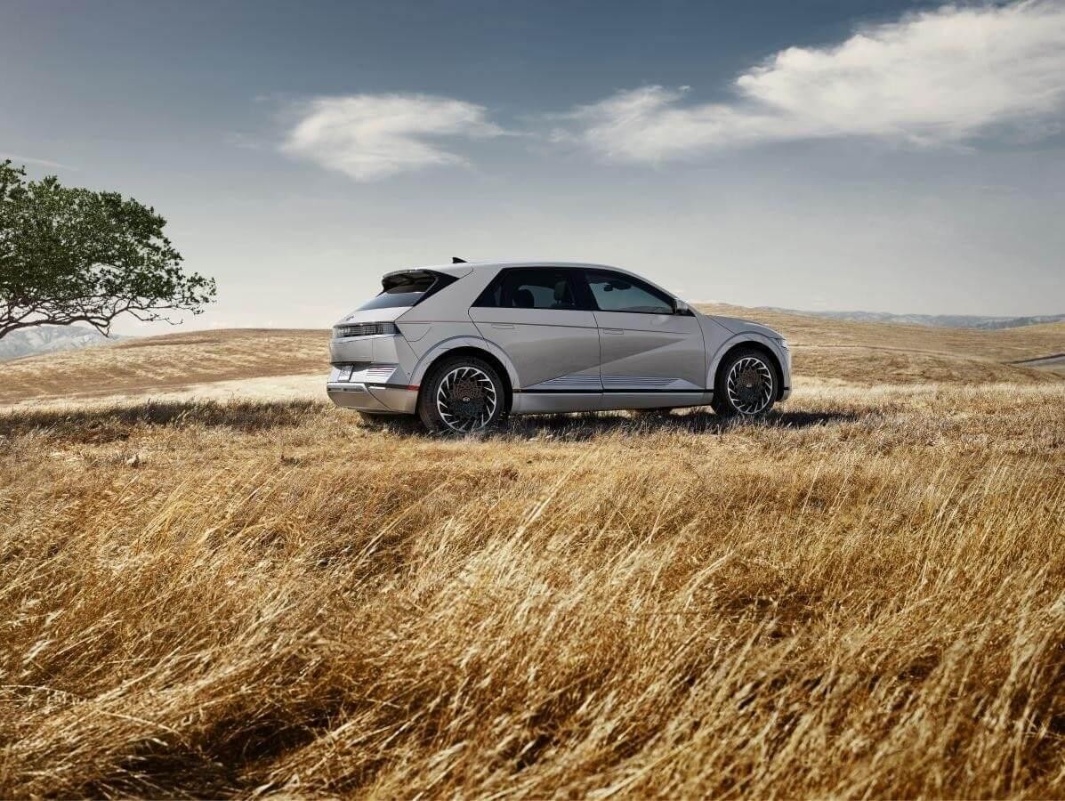 Grey Hyundai Ioniq 5 in a wheat field 