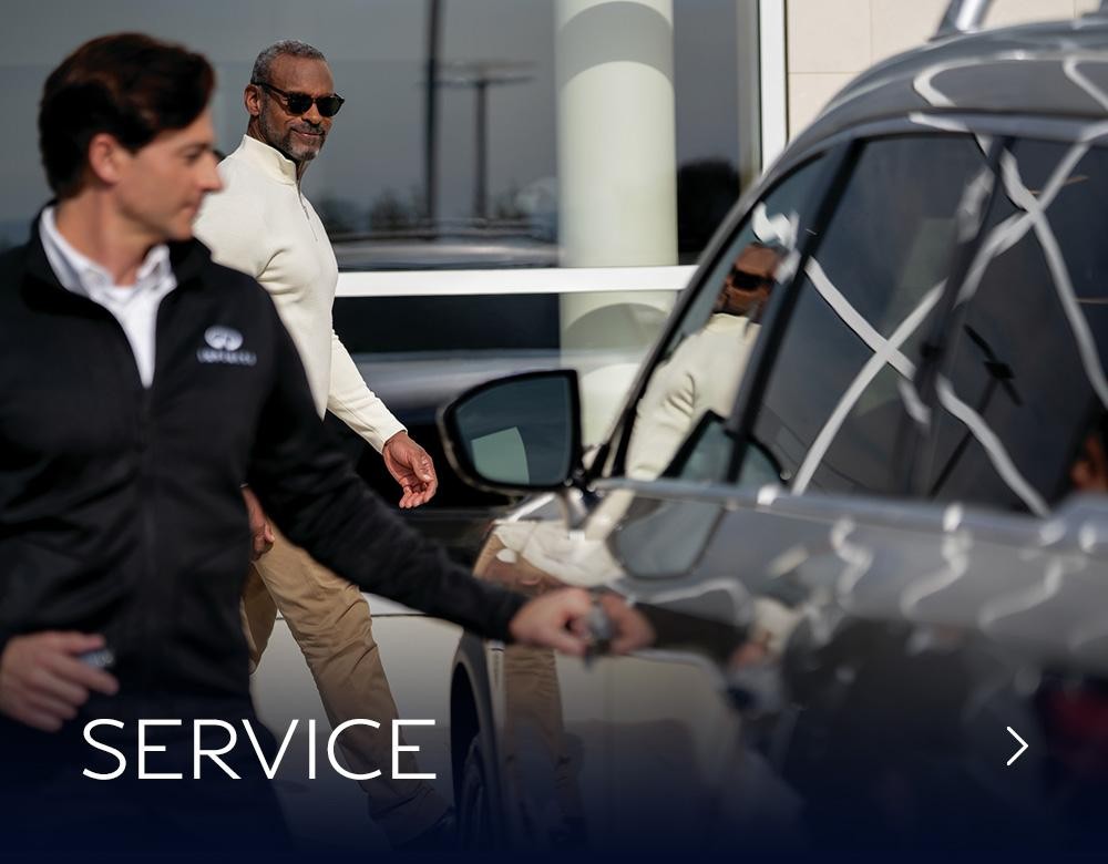 man getting into car to bring to be serviced