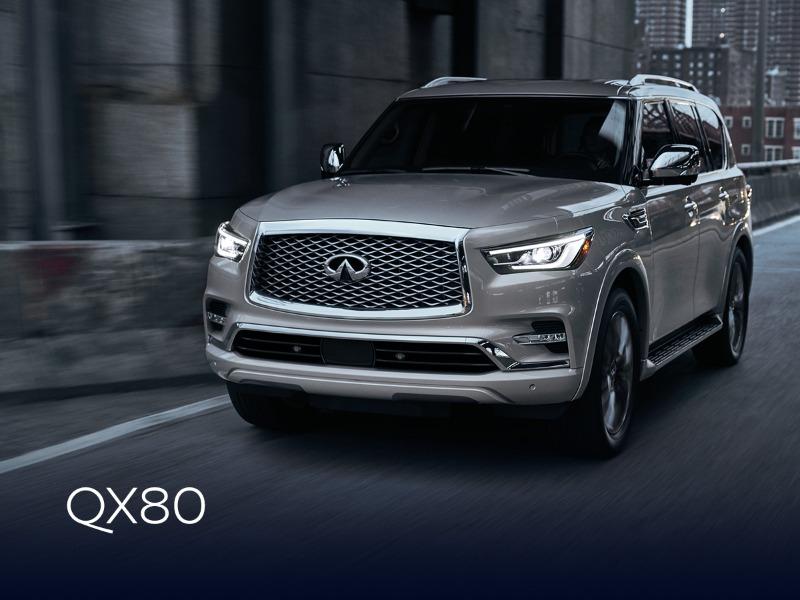 2024 QX80 Silver on a city street