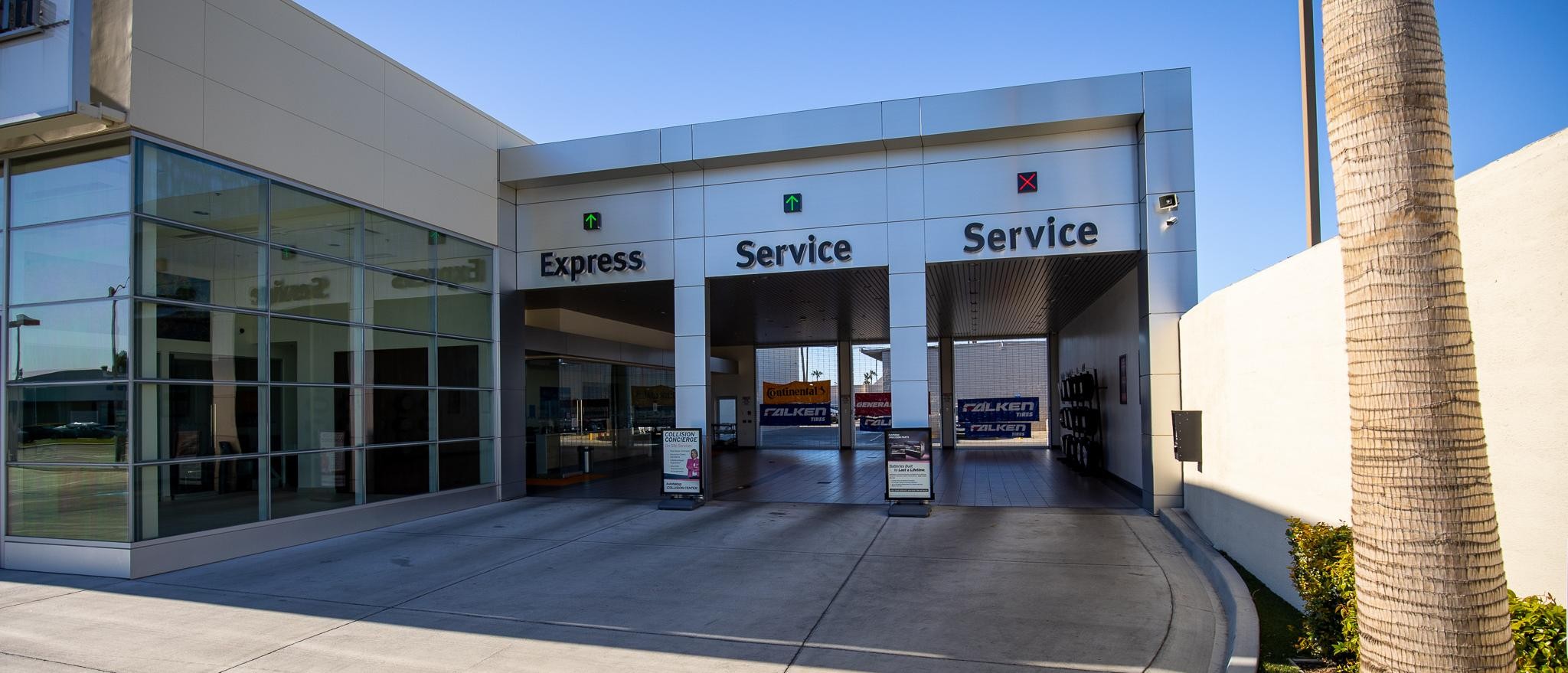 Exterior view of AutoNation INFINITI Tustin's service center entrance