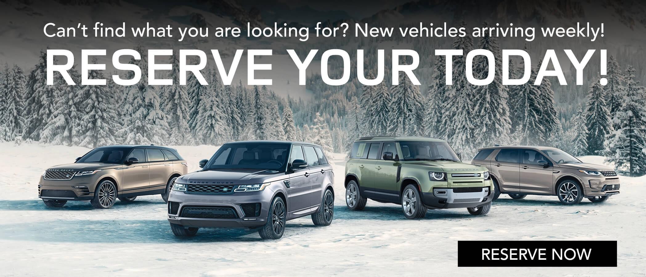 Packshot of Landrover vehicles parked on snow