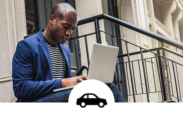 Man on stairs shopping online with sedan car icon