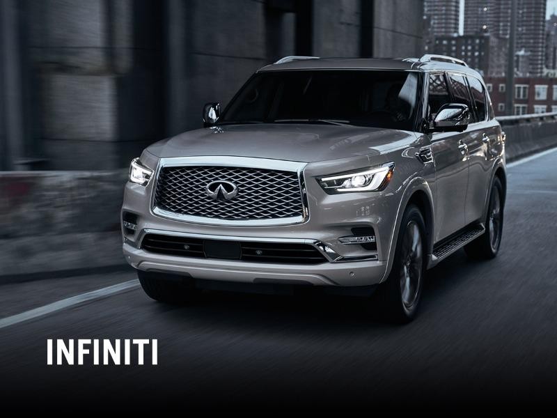 Infiniti QX60 Gray on a city road