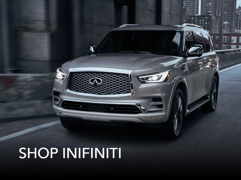 Infiniti QX60 Gray on a city road