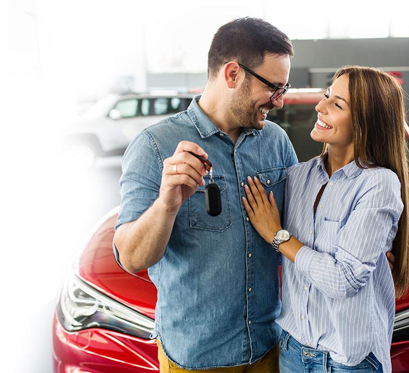 Happy Couple Buying Car