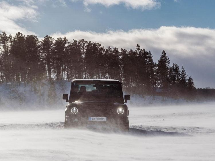 INEOS Grenadier driving through the snow