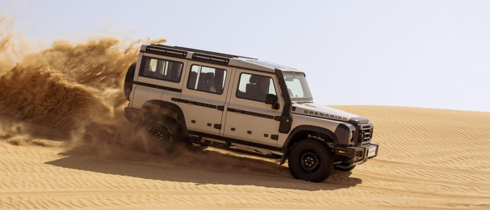 INEOS Grenadier driving on sand dunes