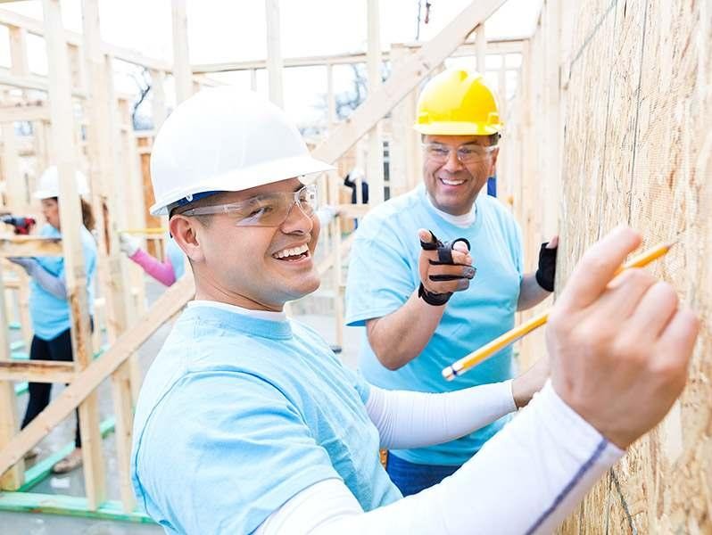 Volunteer Construction Workers Framing House