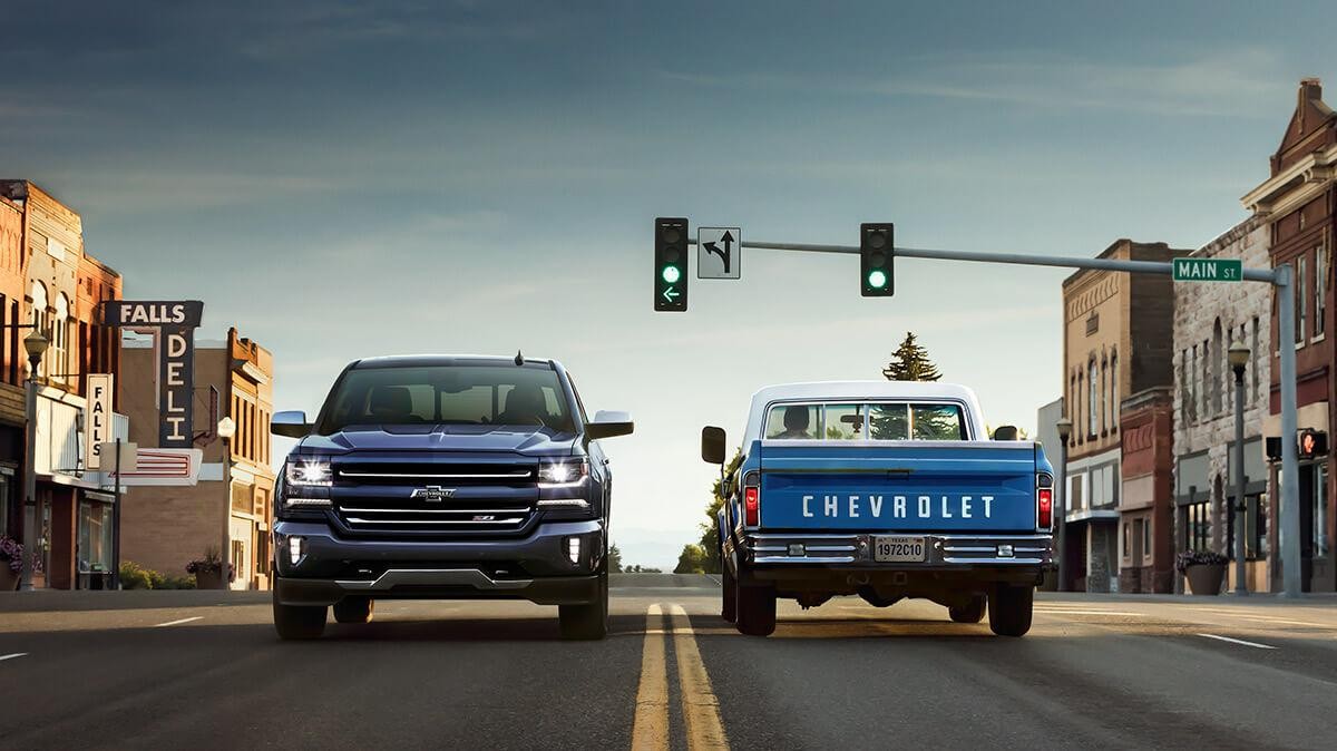 The 2018 Chevy Silverado alongside a 1972 Chevy C10 Truck.