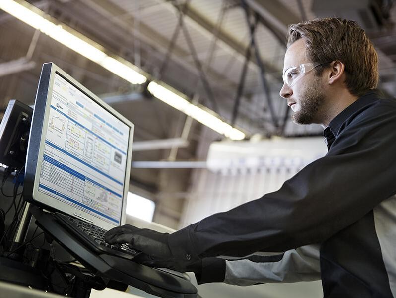 Service technician analyzing vehicle data