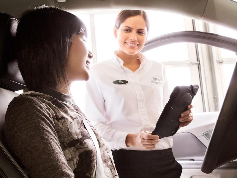 Woman with Buick Service Specialist 