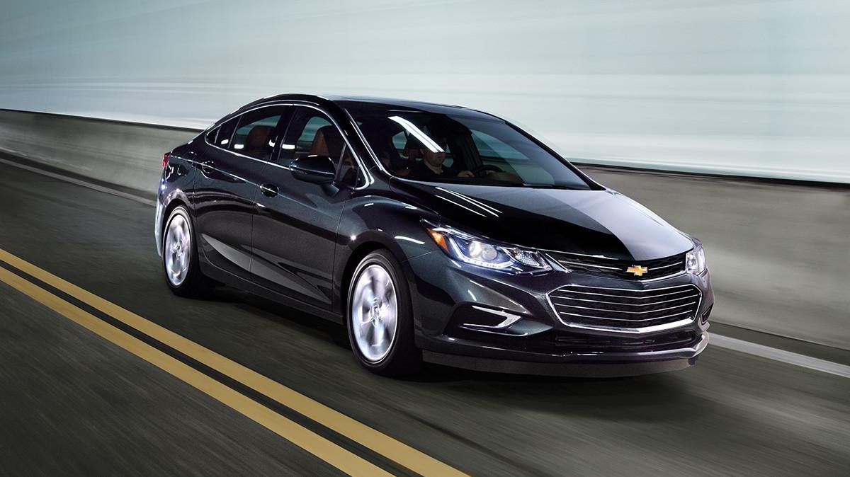 Chevy Cruze driving through a highway tunnel.